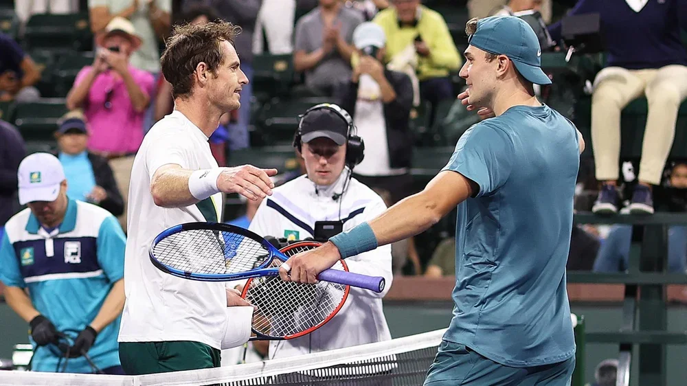 Andy Murray and Jack Draper embrace after their Indian Wells match in 2023